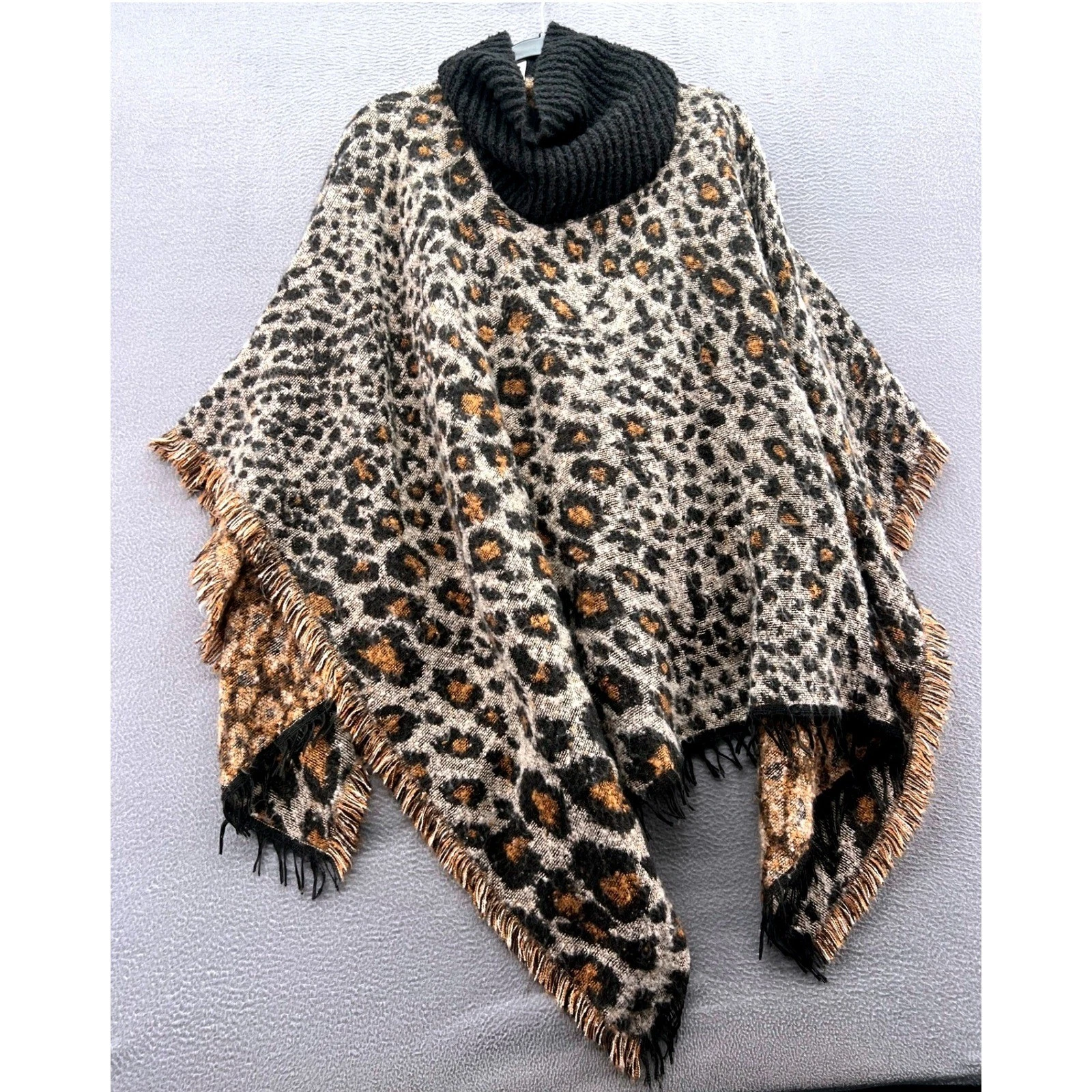 Leopard Print Poncho S-M Knit Turtleneck Fringe Trim Brown Black
Opens in a new window or tab