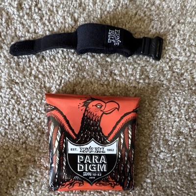 Ernie Ball Paradigm 10-52 guitar strings with dampener 