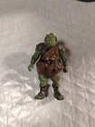 This is a Vintage 1983 Kenner Star Wars Gamorrean Guard action figure.