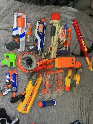 NERF HAND GUN and A LOT OF ACCESSORIES