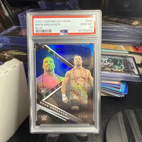 Bron Breakker 2022 Panini Chronicles WWE Panini Black RC #220 Blue 92/99 PSA 10