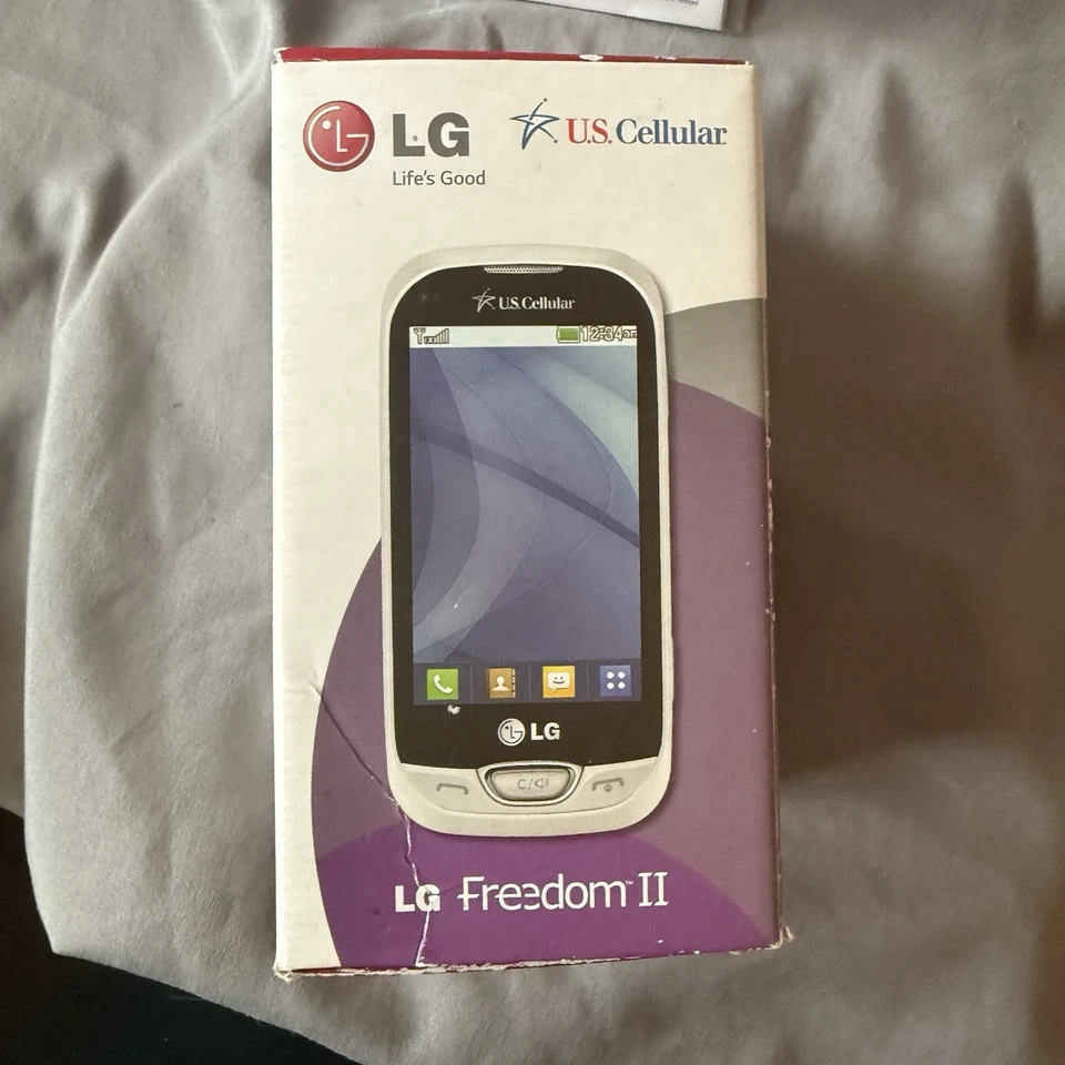 Teléfono celular táctil deslizante con teclado blanco (celular estadounidense) LG Freedom II - UN280 - blanco Foto 2 de 4