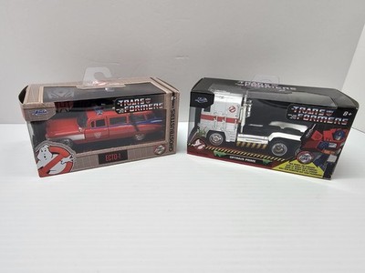 2 Vehicles! Jada Transformers X Ghost Busters(White)Optimus Prime & (Red) ECTO-1