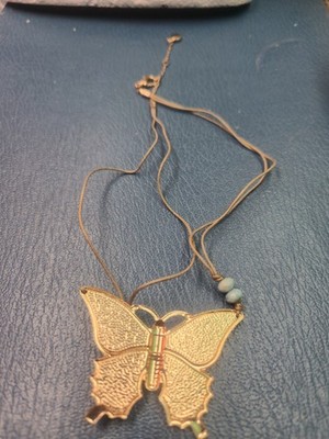 American Eagle Outfitters (AEO) Vintage Butterfly Necklace features a large...