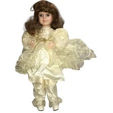Animated Porcelain Doll - arms move in and out like leading music or clapping