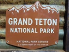 VINTAGE GRAND TETON PORCELAIN SIGN OLD NATIONAL PARK SERVICE NPS WYOMING CABINS