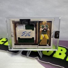 2023 Panini One Sean Clifford Rookie Dual Patch Auto /199 On Card Auto Packers. rookie card picture