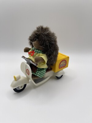 Sylvanian family The hedgehog's father is the manager of the pizza