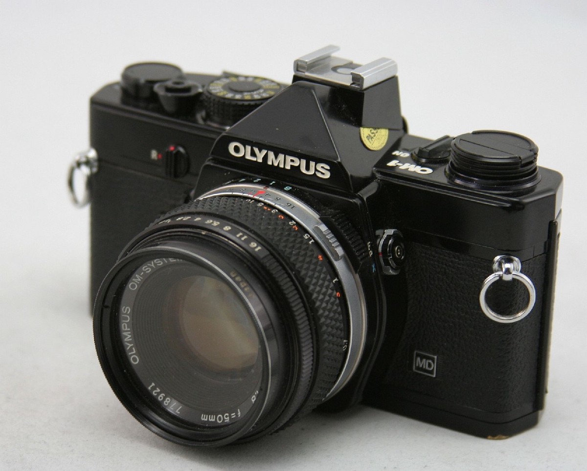 Olympus OM 1 MD camera 35mm SLR + 5x OM Zuiko lens + flash + bags