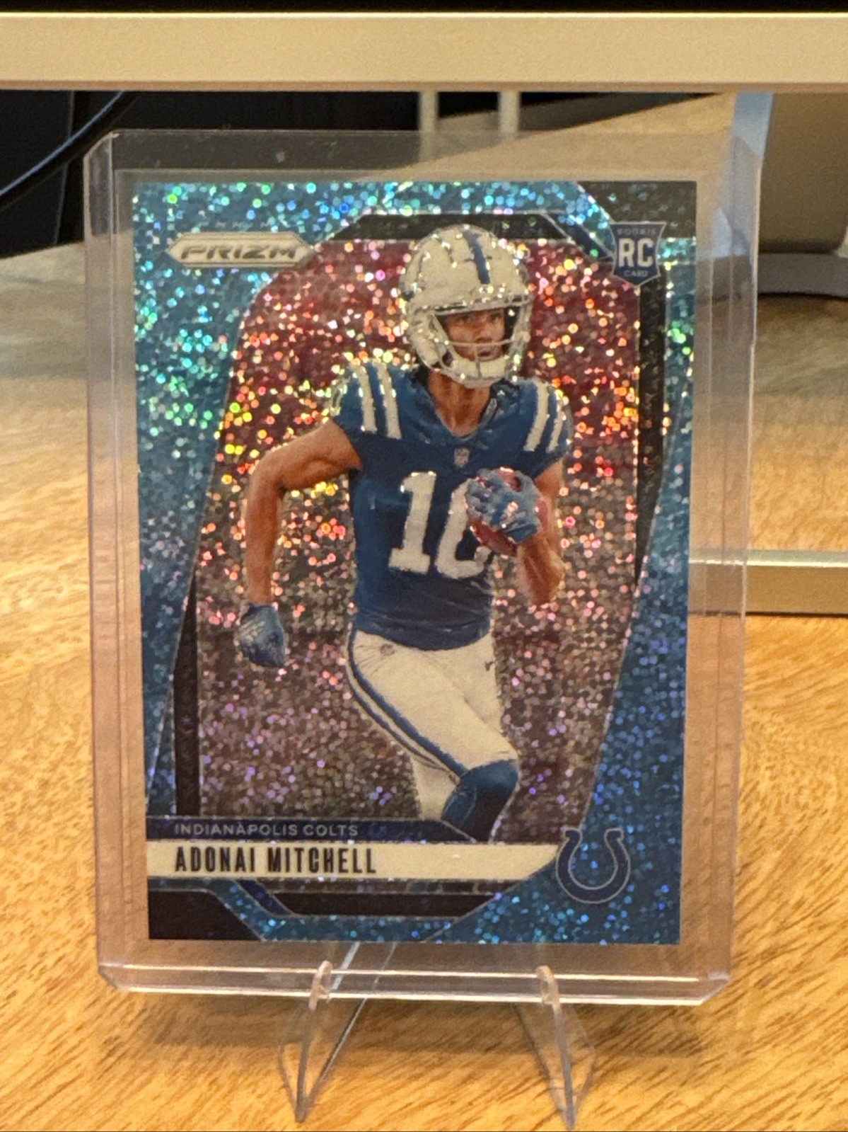 2024 Panini Prizm - Rookies Adonai Mitchell #303 Blue Sparkle Prizm /96 (RC)