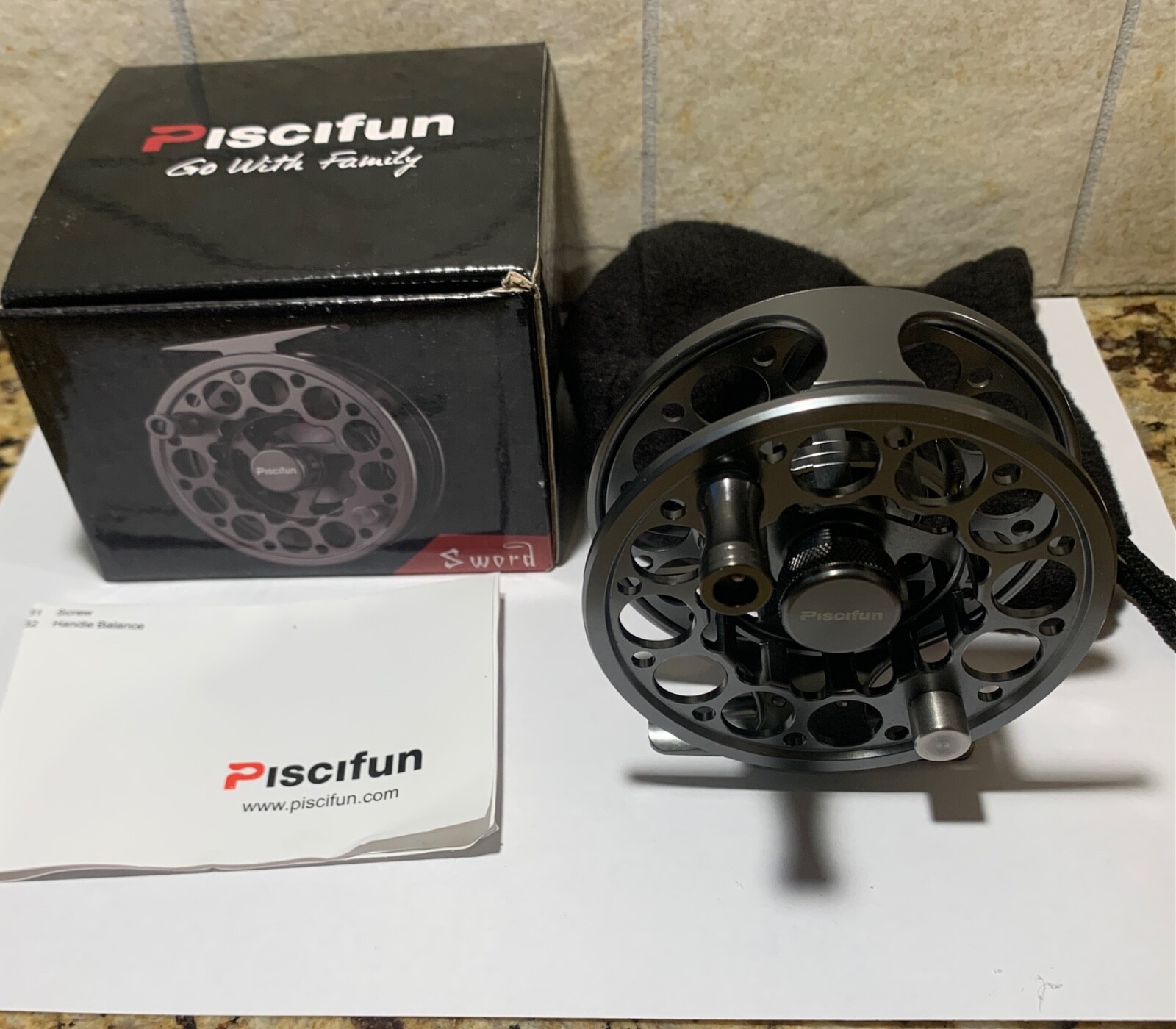 PISCIFUN SWORD 5/6 FLY REEL NEW W/ BOX AND PAPERS