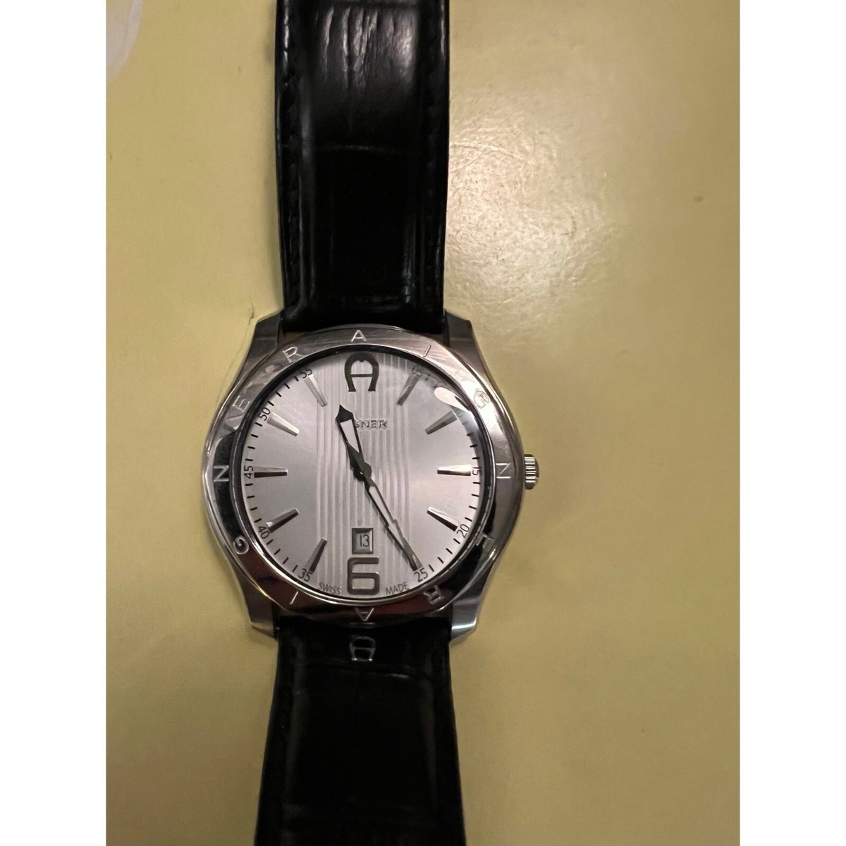 Unisex Aigner Logo Classic Silver Dial Face Watch With Date needs new  battery