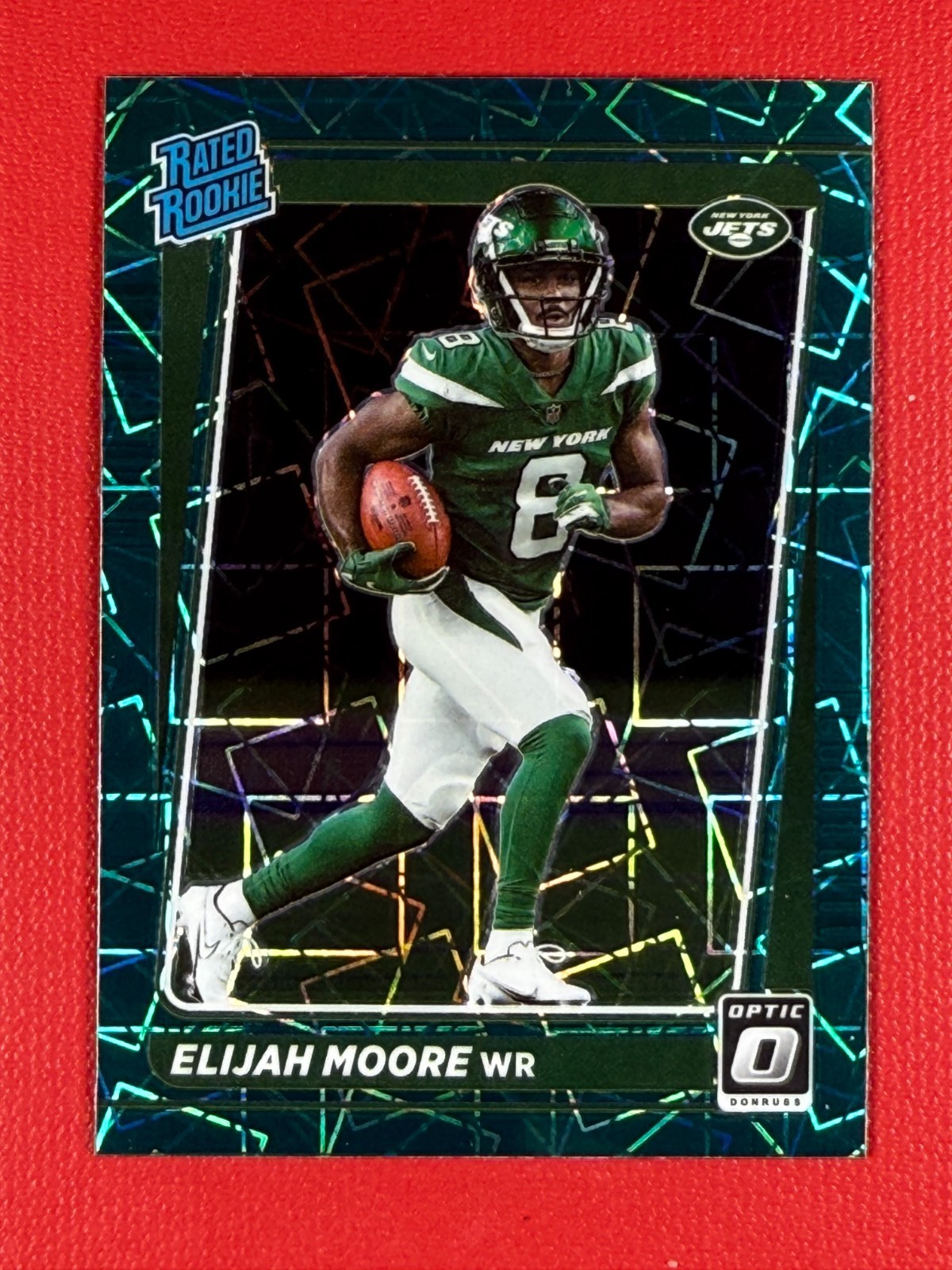 2021 Panini Donruss Optic #216 Elijah Moore Rookie Green Velocity (RC)