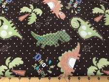 Dinosaur on Brown Flannel fabric sold by the yard 1684