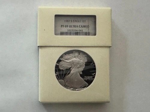 1987-S $1 American Silver Eagle NGC PF69 Ultra Cameo w/Intercept Shield Box