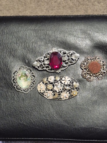 Group Of Four Brooches