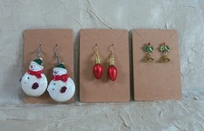 Christmas Three Holiday Earrings Set Snowman Red Bulb  Bells New On Cards