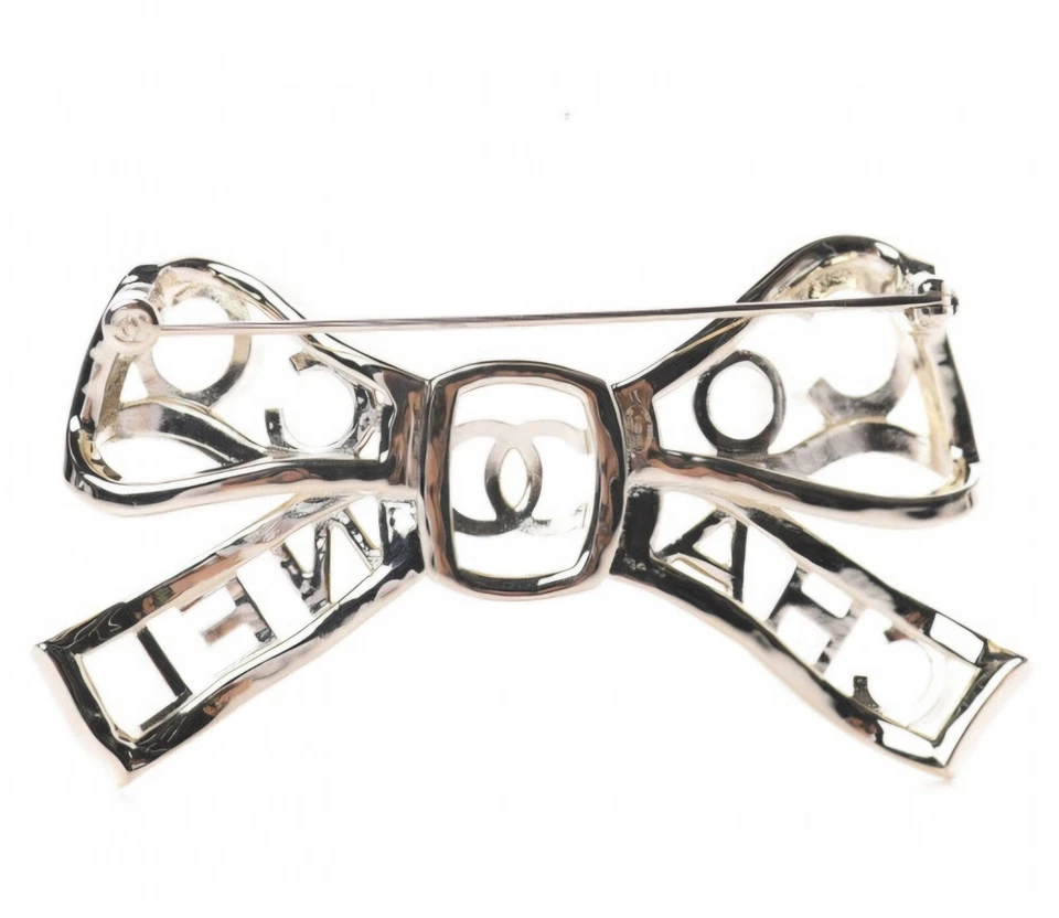 Broche CC Chanel 2020B Champagne Metal Cristal Arco Coco Foto 3 de 4