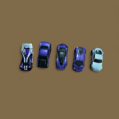 5 Hot wheel racer cars all different makes and models