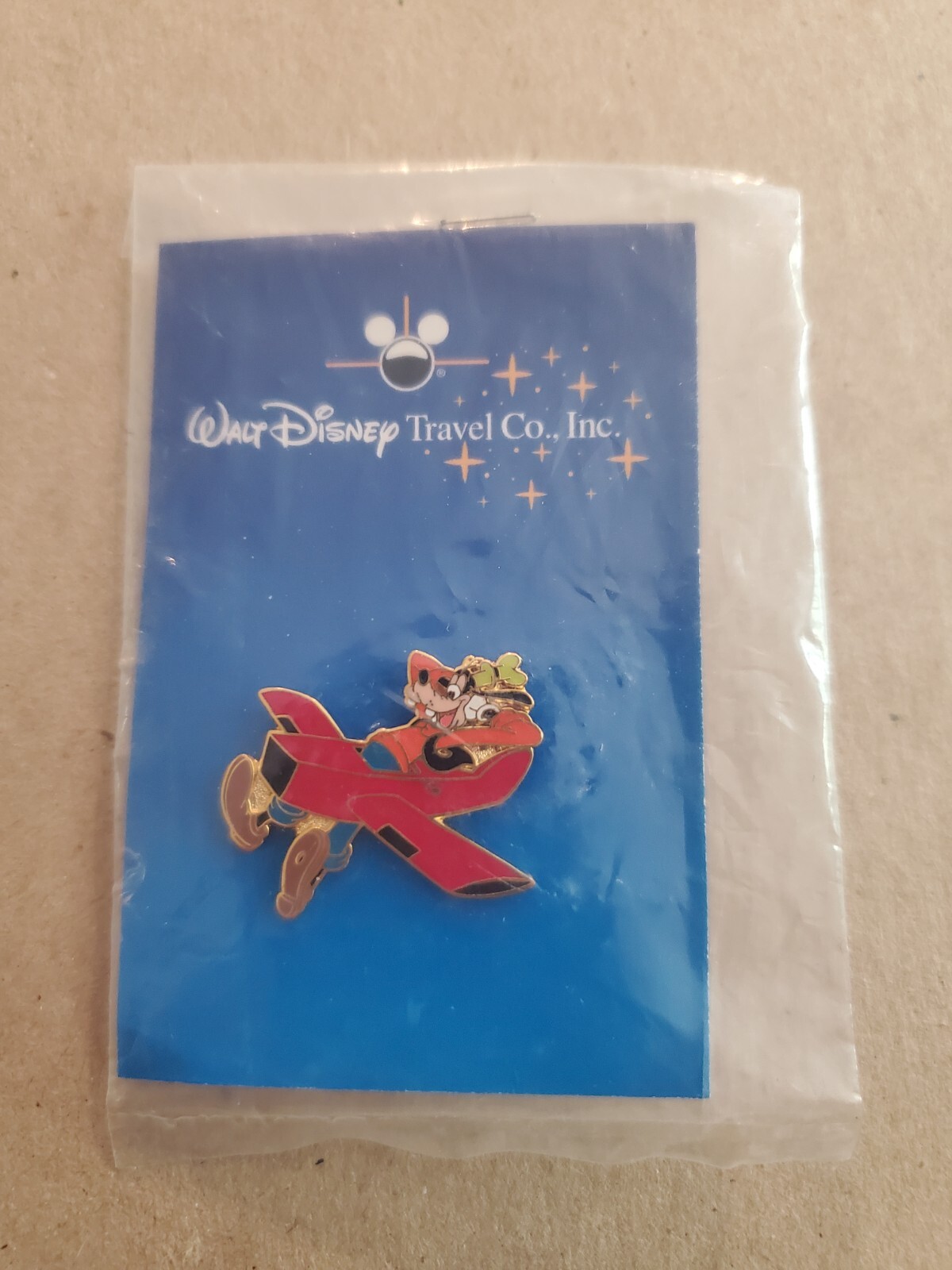 NEW In Package - Walt Disney Travel Company Inc Goofy in a Red Airplane Pin 2004