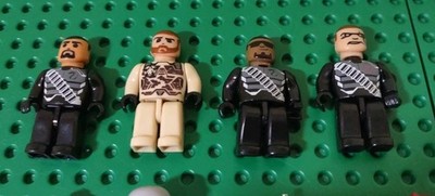 MEGA BLOKS True Heroes 4 Minifigures Lot w Extra Unknown Minifigures & Weapons
