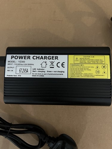 Caricabatteria Talaria Sting/R/ XXX3/ TL45 motore bici da cross 60V (67,2V) 5A - Foto 3 di 7