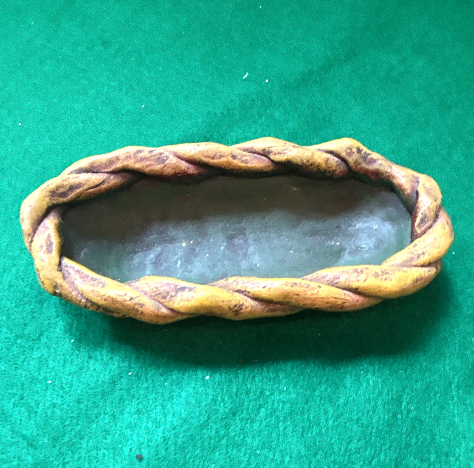 vintage mid-century oval ceramic bowl with distinctive braided twisted rope rim