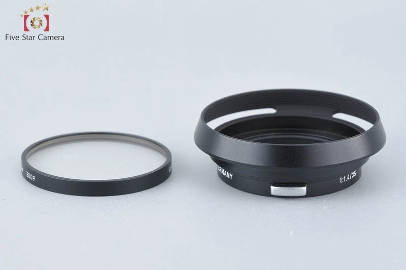 Parasol Leica 12504 para Summilux 35/1.4, Summicron 35/2 + 7 filtro de lente UVa Foto 2 de 4