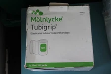 Molnlycke Tubigrip 1437 Size D  10m  10.9yards BAD BOX  Exp 2028