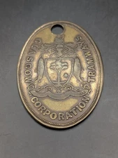 Early Vintage Antique Brass Glasgow Corporation Tramways Pay Check.
