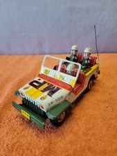 U  Vintage M.P. Military Police Tin Litho Jeep AM-5819 working Friction Car.