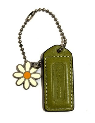 NICE VINTAGE COACH EMBOSSED GREEN LEATHER DAISY MOTIF BAG HANGTAG