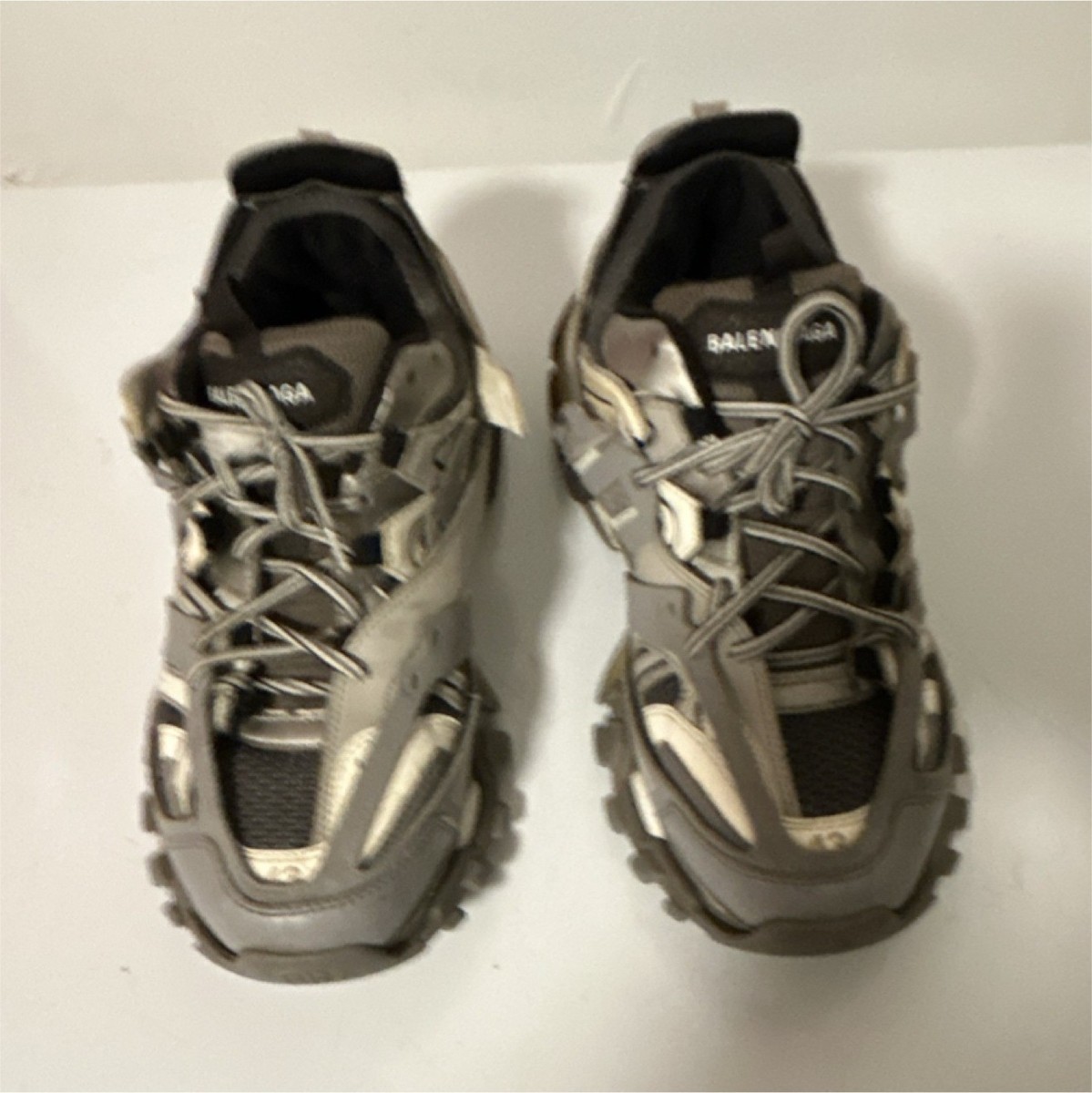 Balenciaga Track sneakers in a grey and white colorway. | eBay