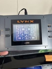 Atari Lynx Handheld Console Bundle with Carrying Case and 11 Games Manuals