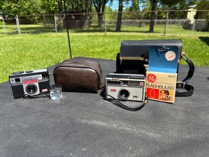 Kodak Instamatic Cameras with Flash Bulbs and Cases