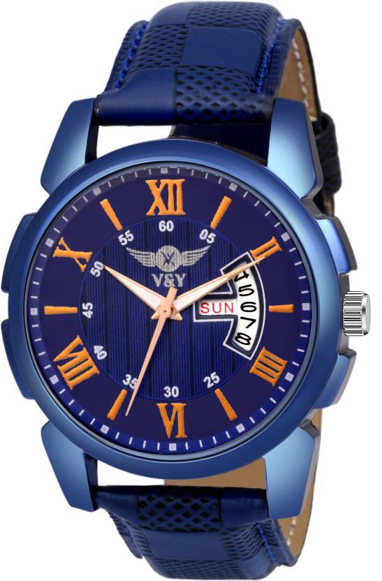analog watch with date and day display
