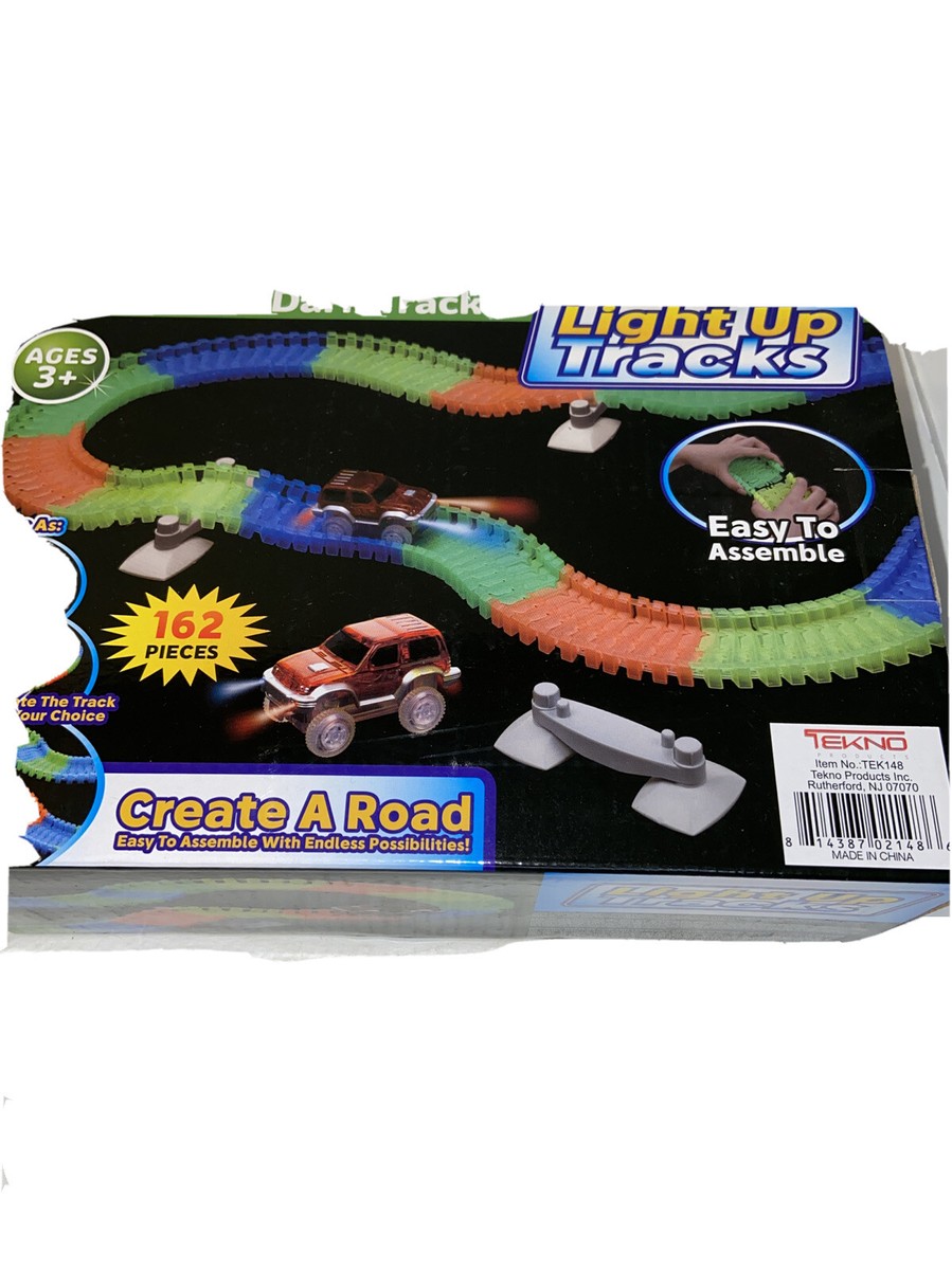 Light Up Tracks Car Glow In The Dark Toys Kids Racing 162 Piece Set New in  Box