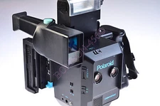 POLAROID MINIPORTRAIT INSTANT CAMERA M-203. TESTED-WORKING. V-GOOD. *WITH BACK*