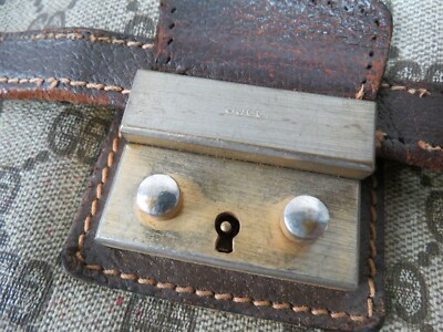 VTG Gucci made in Italy full GG Logo Gold medal clasp Business