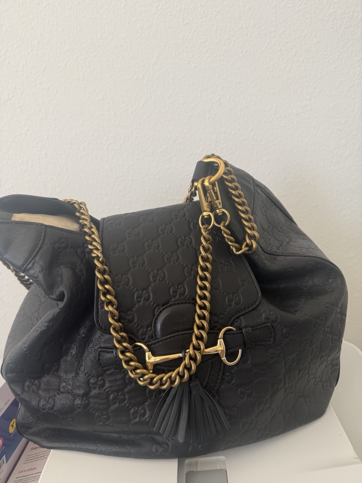 Gucci Black GG Embossed Shoulder Bag Gold Chain Strap Tassel Designer