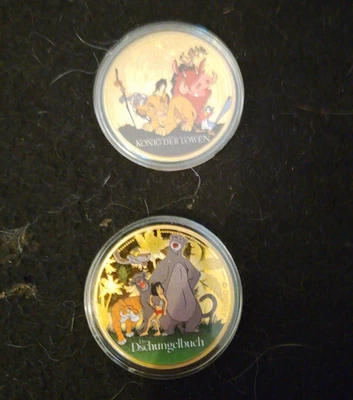 Disney Sammlermünzen König der Löwen & Das Dschungelbuch Motive - Bild 1 von 2