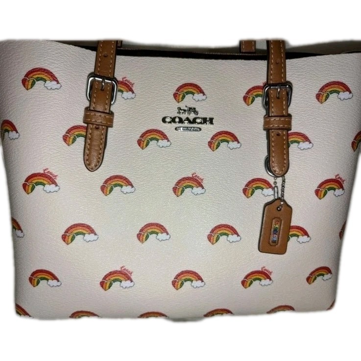 coach backpack pride Men's Hitch Leather Backpack, Brass/Saddle Multi - - Rainbow, Large, Hitch with Varsity Stripes, Brass/Saddle Multi - Pride Coach | A duffle with