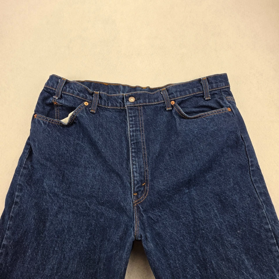 Pantalones de mezclilla vintage años 90 Levi's 20517 0217 Saddleman corte bota para hombre 42x30 pestaña naranja EE. UU. Foto 2 de 4