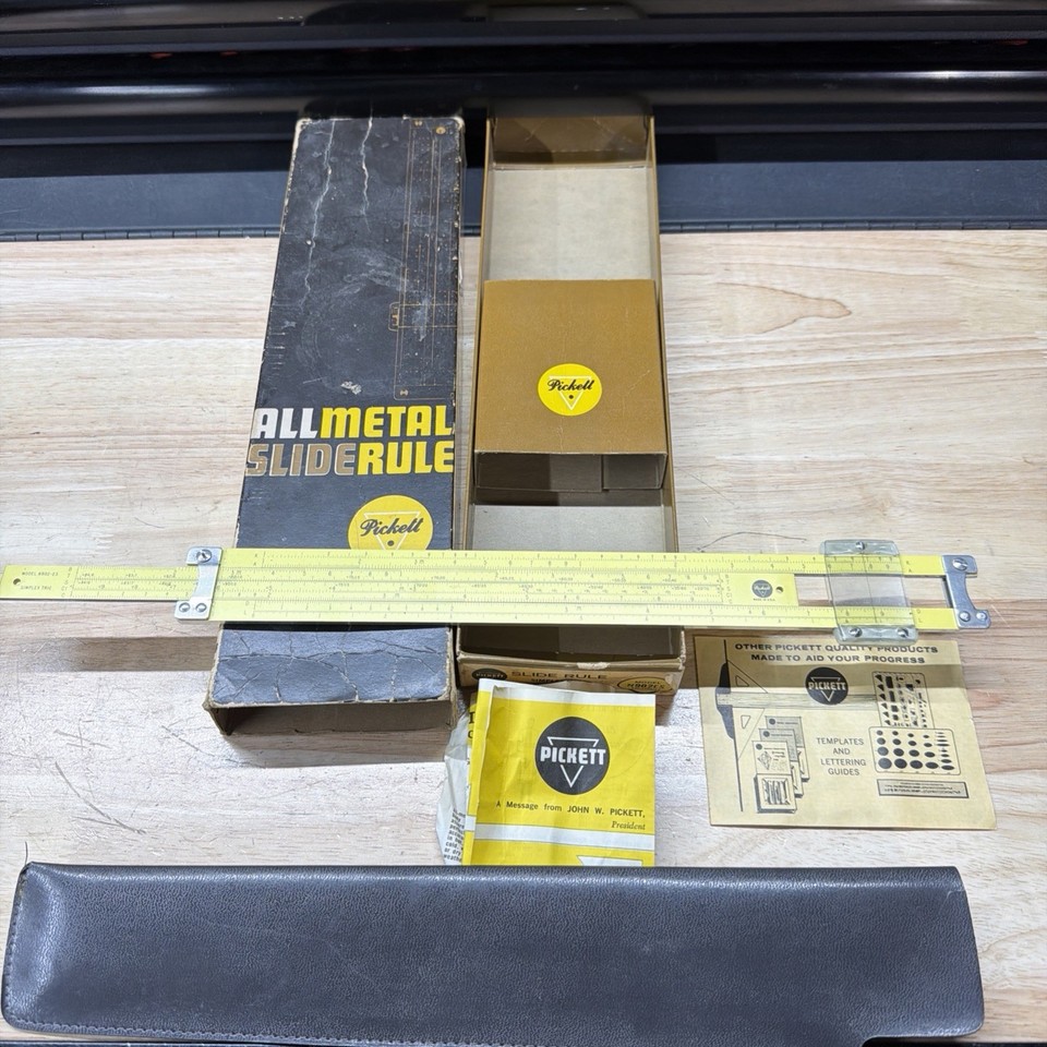 A clean USA-made Pickett log log slide rule with original pouch and box — a complete, display-ready analog computing relic at a great entry price.
