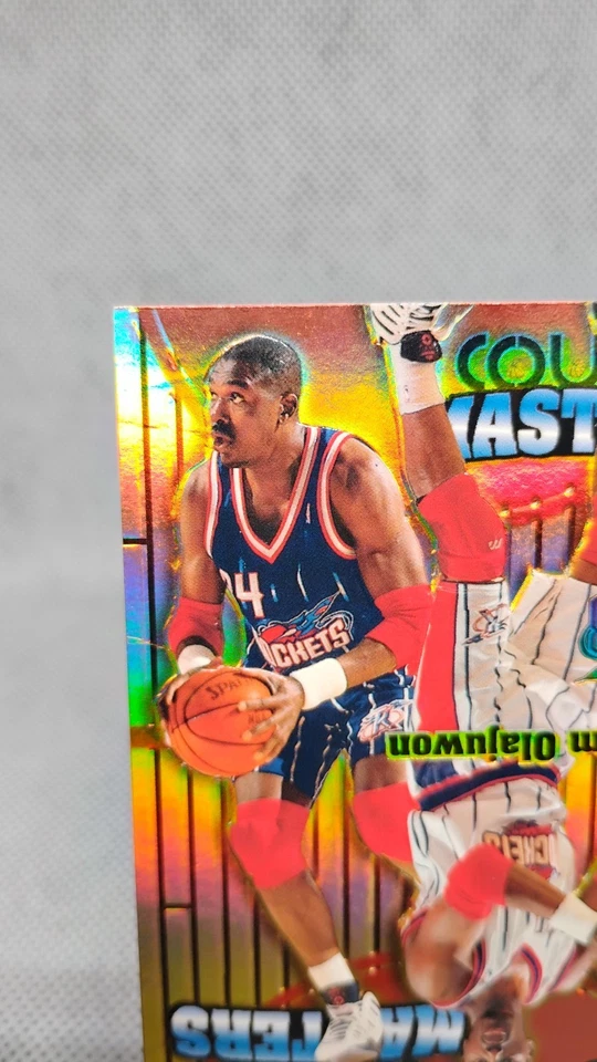Fleer Ultra Hakeem Olajuwon 1997-98 #17 cm Court Masters SP Rockets Foto 4 de 4