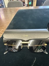 Cartier model g40h53h9 rimless sunglasses 48 17 Please See Photos