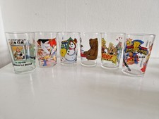 set of 6 charactor glasses. snowman cosmocats.tin.tin & more