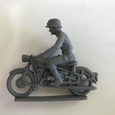 Vintage Marx Plastic German Army Man Riding Motorcycle. Dark Grey.