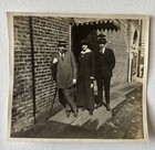 Antique Snapshot Photo 2 Young Men And Lovely Woman Posing By Brick Building