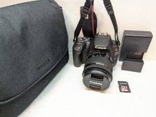 Canon Rebel SL2 Camera  18-55mm IS STM Lens Kit - 3,359 Shutters  32GB  Case